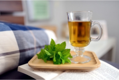 Drink green tea- Quick Home Remedies to Get Rid of Headaches